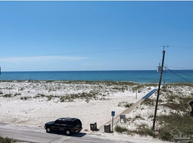 property view of water featuring a view of the beach