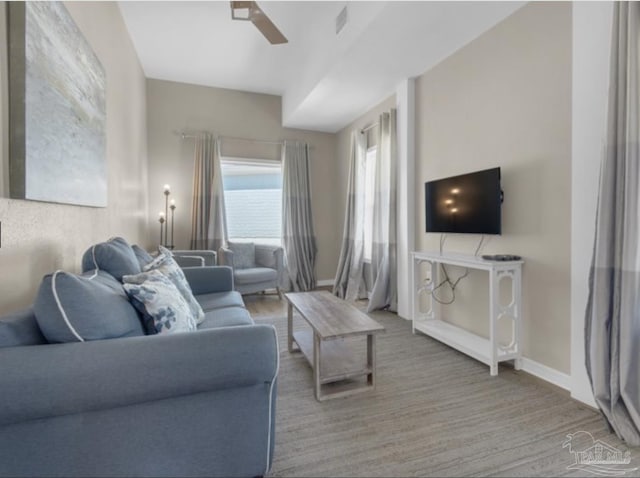 living room featuring ceiling fan