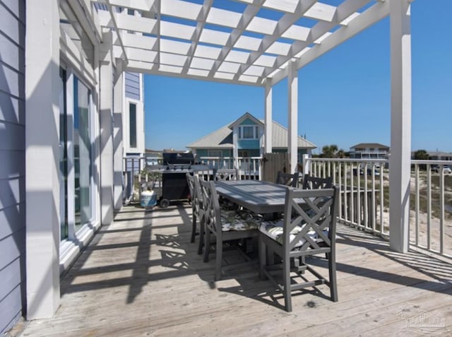 wooden terrace with a pergola