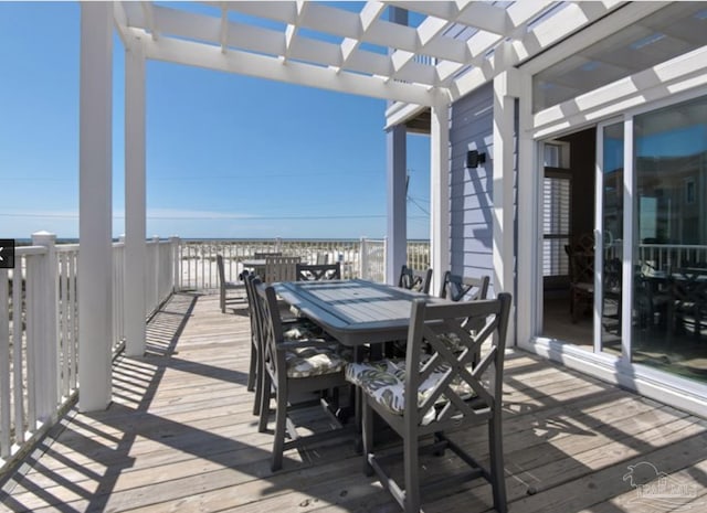 wooden terrace with a pergola