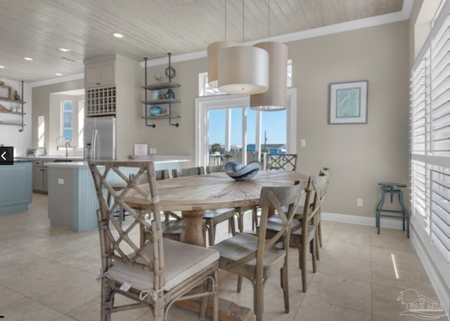 tiled dining area with ornamental molding, sink, a wealth of natural light, and wooden ceiling