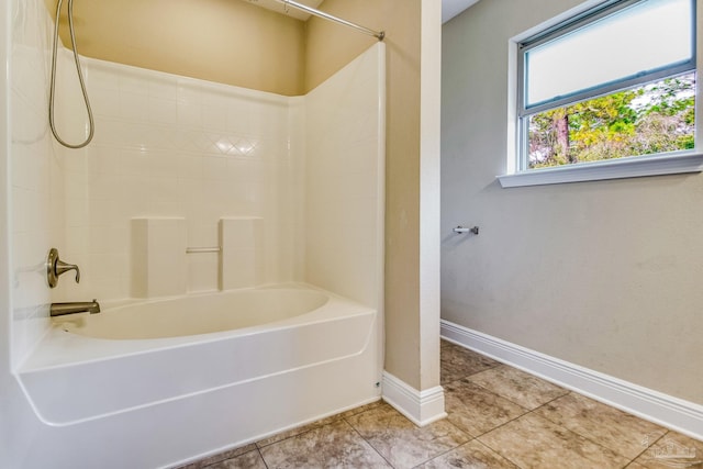 bathroom featuring tile patterned floors and shower / bathtub combination