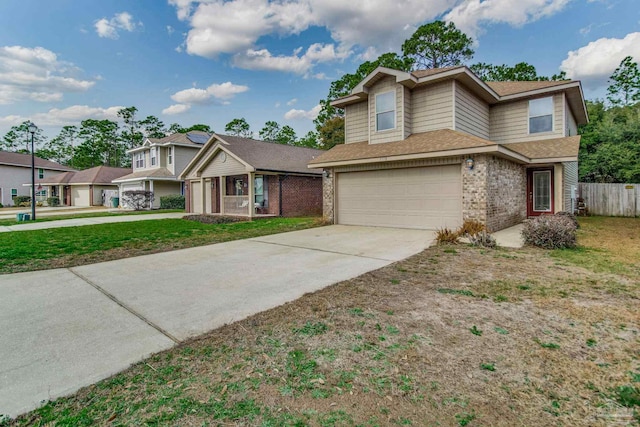 view of front of home with a garage and a front lawn