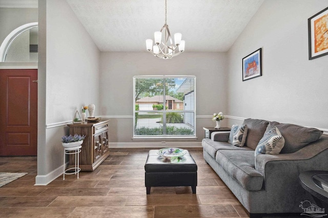 1328 Tour Dr, Gulf Breeze, FL 32563 - living room with a chandelier, a textured ceiling, and wood finish floors
