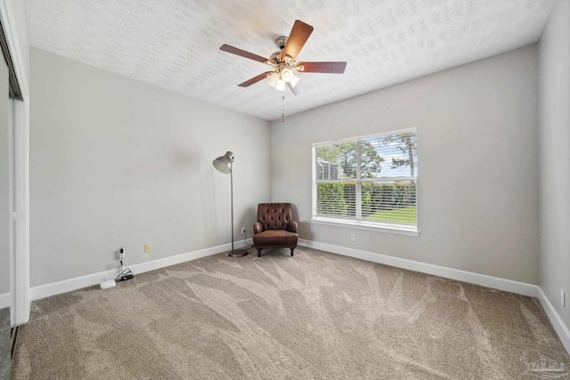 1328 Tour Dr, Gulf Breeze, FL 32563 - unfurnished room with carpet flooring, baseboards, a textured ceiling, and ceiling fan