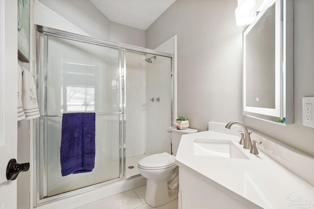 1328 Tour Dr, Gulf Breeze, FL 32563 - full bathroom featuring vanity, a stall shower, toilet, and tile patterned floors