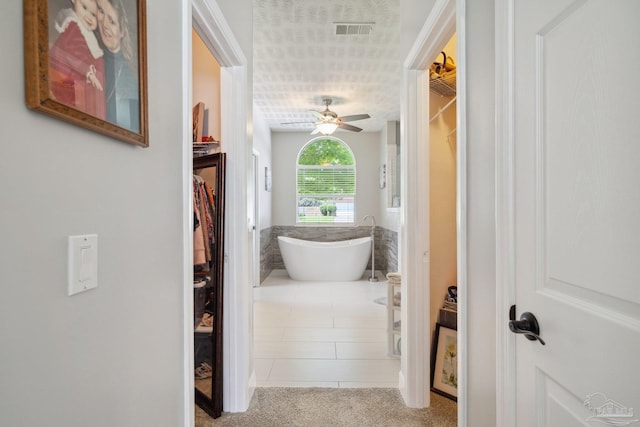 1328 Tour Dr, Gulf Breeze, FL 32563 - corridor with tile patterned flooring and carpet