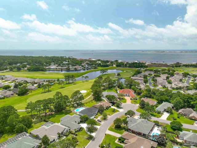 1328 Tour Dr, Gulf Breeze, FL 32563 - aerial overview of property's location with a nearby body of water, nearby suburban area, and a local golf course
