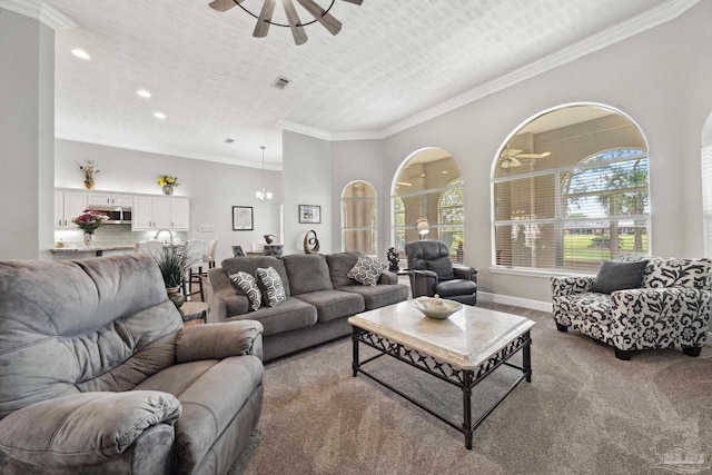 1328 Tour Dr, Gulf Breeze, FL 32563 - living area featuring carpet floors, ceiling fan, crown molding, baseboards, and recessed lighting
