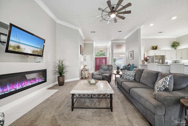 1328 Tour Dr, Gulf Breeze, FL 32563 - living room with ceiling fan, light colored carpet, crown molding, a glass covered fireplace, and baseboards