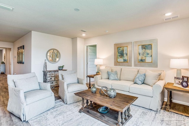 6340 Firefly Dr, Milton, FL 32583 - living room with baseboards and visible vents