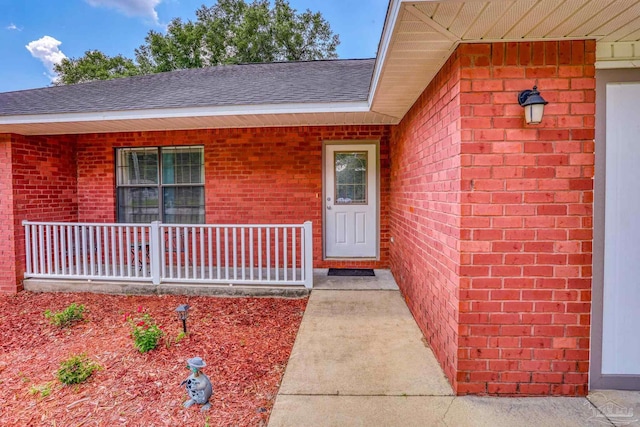 entrance to property with a porch