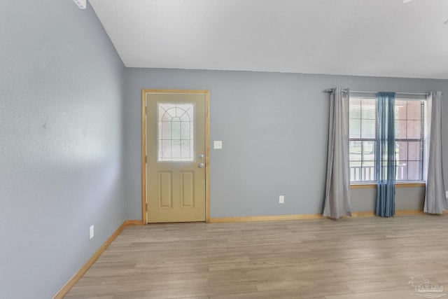 entryway with light hardwood / wood-style flooring