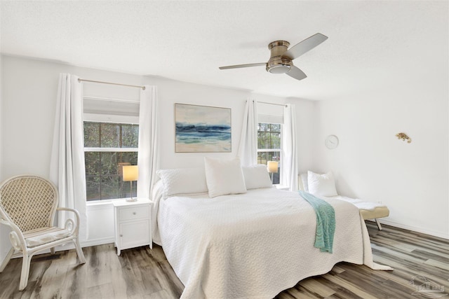 3228 Birdseye Cir, Gulf Breeze, FL 32563 - bedroom featuring light wood finished floors and a ceiling fan
