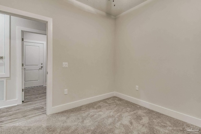 view of carpeted spare room