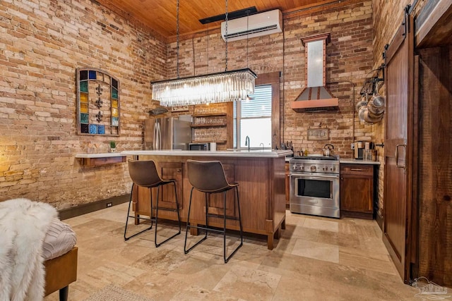 kitchen featuring ventilation hood, an AC wall unit, decorative light fixtures, wood ceiling, and stainless steel appliances