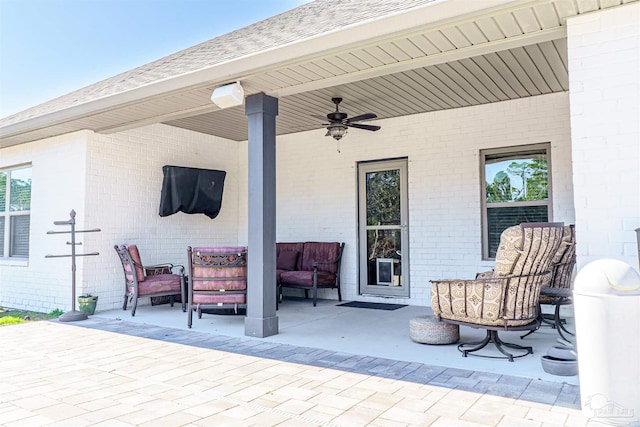 view of patio / terrace featuring ceiling fan