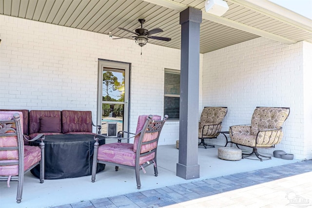 view of patio featuring ceiling fan