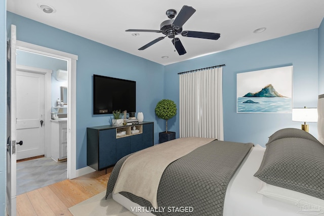 bedroom featuring recessed lighting, a ceiling fan, and light wood-style floors