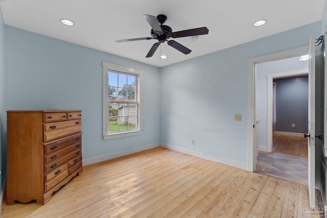 unfurnished bedroom with light wood-style floors, baseboards, a ceiling fan, and recessed lighting