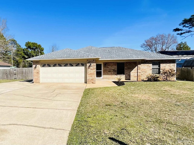 single story home featuring an attached garage, a front lawn, concrete driveway, and brick siding