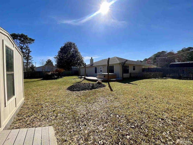 view of yard with a fenced backyard