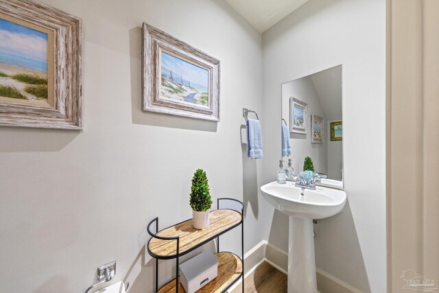 217 W Jackson St Unit 12, Pensacola, FL 32501 - bathroom with baseboards and wood finished floors