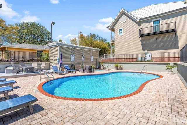 217 W Jackson St Unit 12, Pensacola, FL 32501 - pool featuring fence and a patio