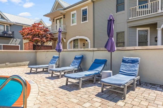 217 W Jackson St Unit 12, Pensacola, FL 32501 - view of patio / terrace with fence