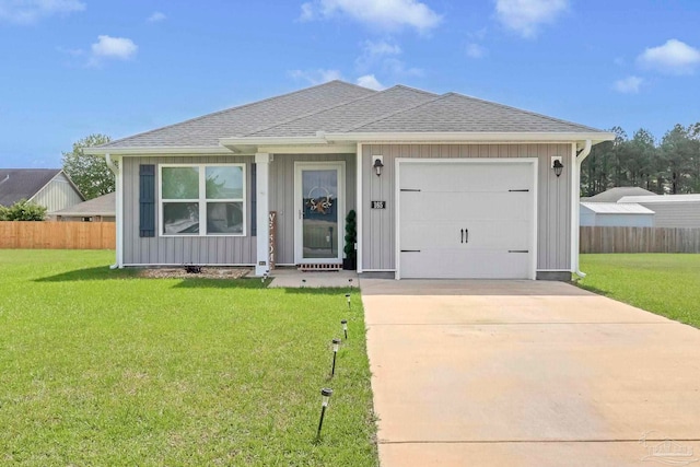 view of front of home with a garage, concrete driveway, roof with shingles, and board and batten siding