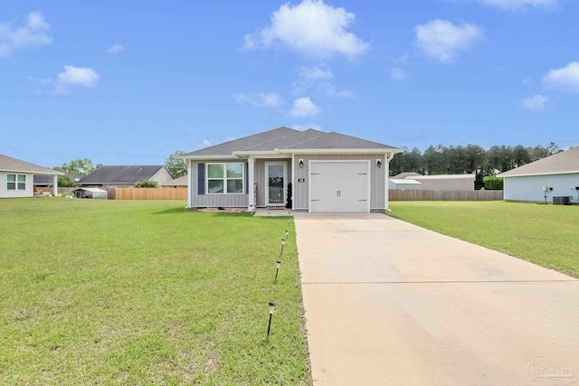 view of front of house with a garage, driveway, central air condition unit, board and batten siding, and a shingled roof