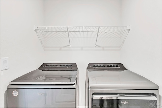 washroom with washer and clothes dryer