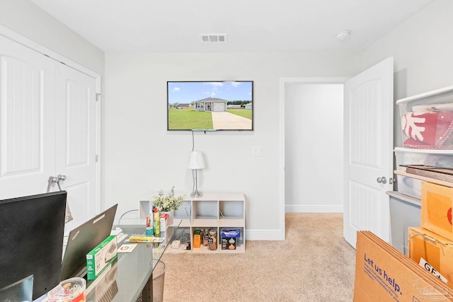 rec room with carpet, a desk, and baseboards