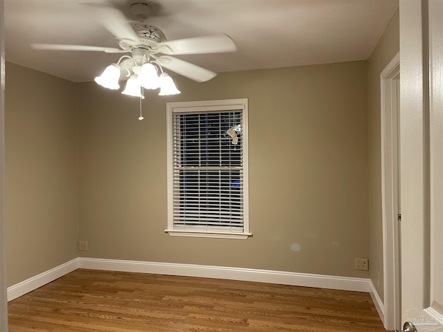 3036 Laurel Dr, Gulf Breeze, FL 32563 - spare room featuring a ceiling fan, wood finished floors, and baseboards