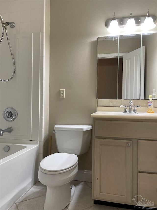 3036 Laurel Dr, Gulf Breeze, FL 32563 - bathroom featuring tile patterned floors, toilet, vanity, and bathtub / shower combination