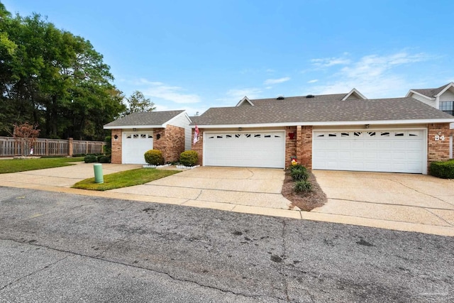 single story home featuring a garage