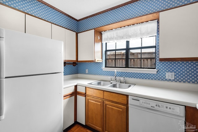 kitchen with white appliances and sink