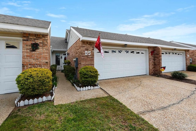 single story home featuring a garage