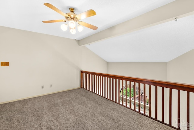 additional living space featuring carpet, lofted ceiling with beams, and ceiling fan