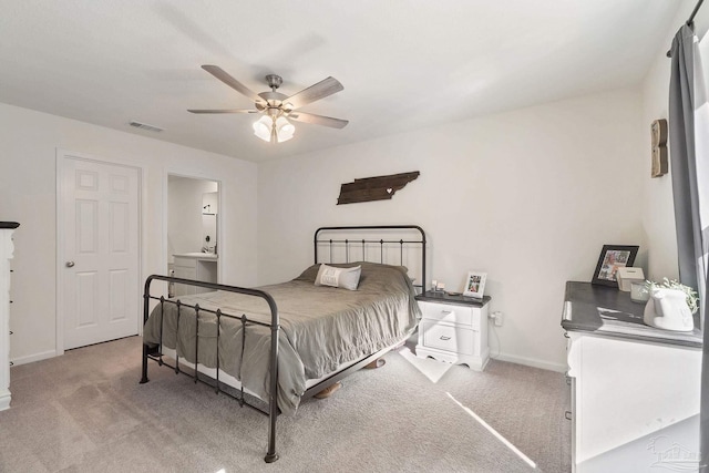 bedroom featuring carpet floors, baseboards, visible vents, and ceiling fan