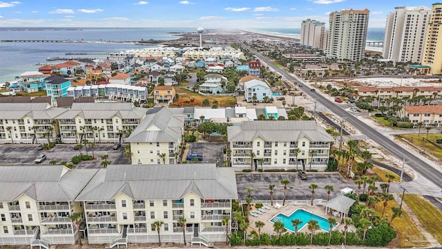 drone / aerial view with a water view