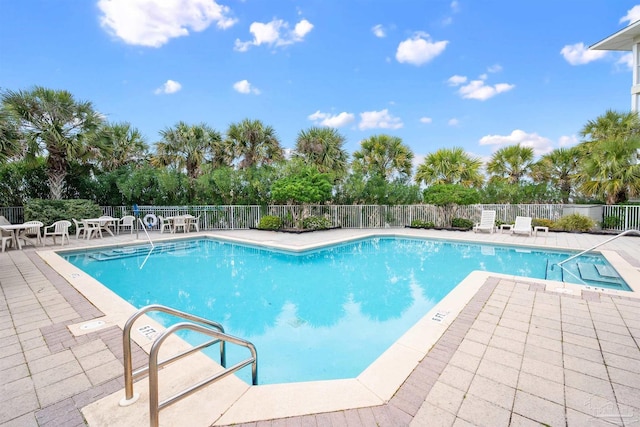 view of pool featuring a patio