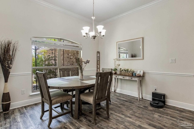 dining room featuring baseboards, dark wood finished floors, a notable chandelier, and ornamental molding