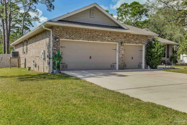 view of front facade with brick siding, an attached garage, a front yard, central AC, and driveway