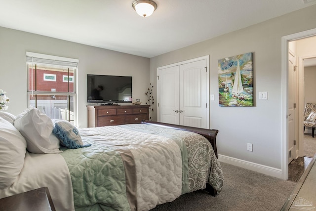 carpeted bedroom featuring a closet