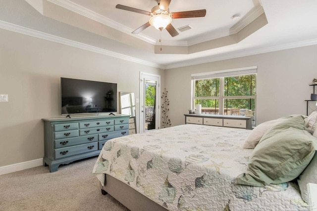 bedroom with ceiling fan, light carpet, and ornamental molding