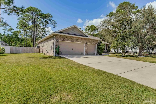 view of property exterior featuring brick siding, fence, and a lawn