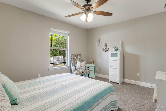 bedroom with ceiling fan and carpet