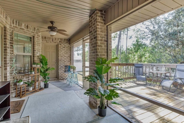 exterior space featuring ceiling fan