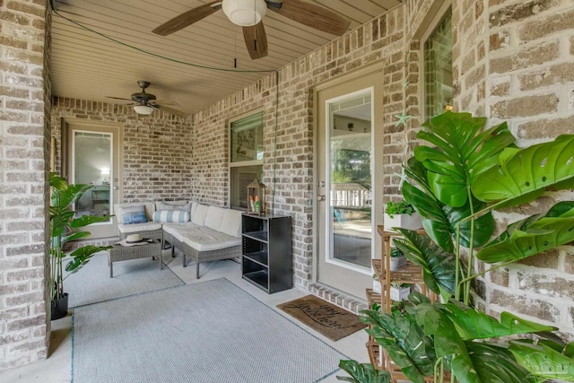 view of patio / terrace featuring ceiling fan